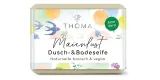 rechteckige, hellgelbe Seife mit bunter Verpackung und Aufschrift Maienlust, Sheabutterseife mit Aloe Vera vegan von der Naturseifen Manufaktur Uckermark.