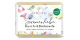 rechteckige beigeSeife mit bunter sommerlicher Verpackung und Aufschrift Sommerliebe, vegane Mandelmilch Seife von der Naturseifen Manufaktur Uckermark.